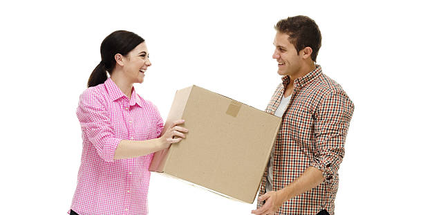 istock Happy couple holding box 503950272