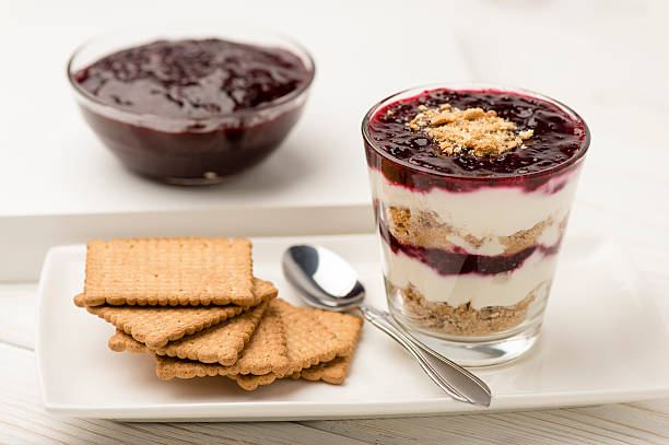 istock Dessert with natural yogurt, biscuits and black currant jam. 503950872