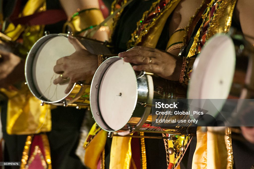 Carnival - Brazil Florianópolis, Brazil - March 01, 2014: Members of a local samba school called "Escola de Samba Consulado do Samba", performing with Brazilian friction drum during the 2014 Carnaval Parade in Florianópolis, Santa Catarina State - Brazil. Arts Culture and Entertainment Stock Photo