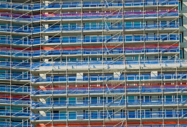 istock Scaffolding surrounds condominium under construction 503954372