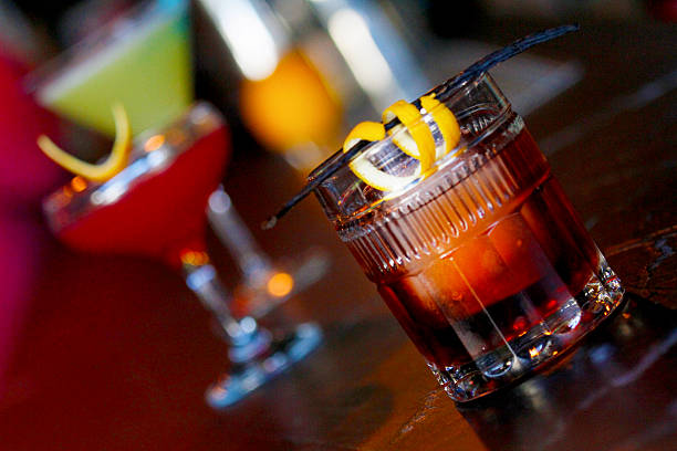 elegant red cocktail in focus and two in the background