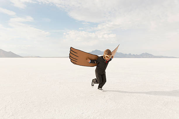 istock Young Boy Businessman is Flying Away 503955588