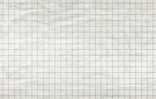 Photo of Old squared paper sheet, seamless background texture
