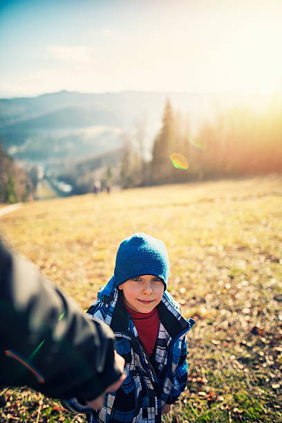 istock Hiking with son on cold sunny autumn day 503958018