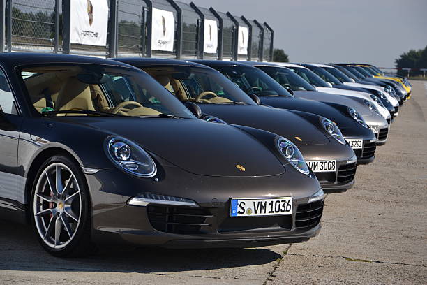 Poznan, Poland - October 3rd, 2012: Porsche 911 with Sport Driving School stopped on the Poznan Racetrack during the test drives. The Poznan circuit is one of the best circuits in Eastern Europe for a driver training.