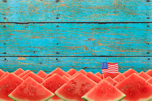 愛国心スイカピクニックにスライスの旗 - picnic watermelon tablecloth picnic table ストックフォトと画像