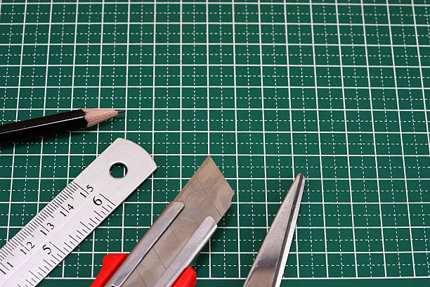 istock Closeup of ruler,scissors, cutter, cutting mat, pencil 503980038
