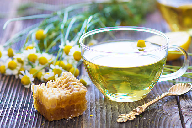 istock Chamomile tea with chamomile flowers 503988356