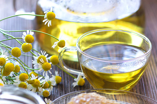 istock Chamomile tea with chamomile flowers 503988812