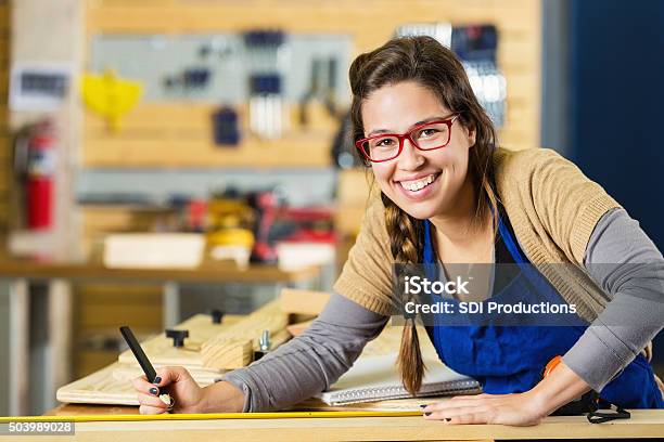 Artist Working With Wood In Carpentry Shop Or Makerspace Stock Photo - Download Image Now