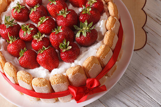 istock Delicate dessert strawberry cake with Savoiardi closeup. horizon 503989464
