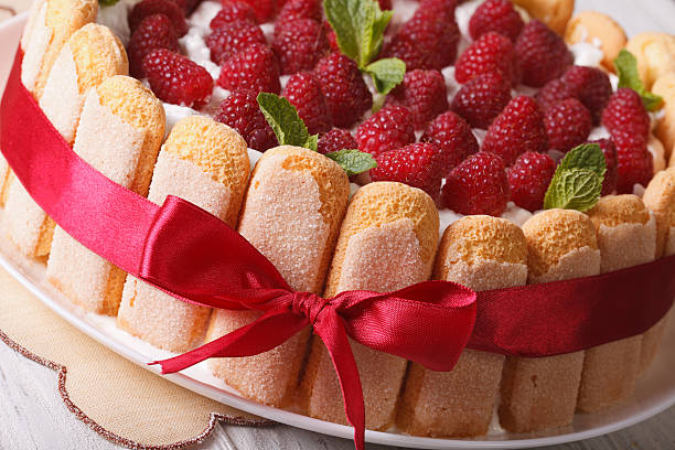 istock Beautiful dessert raspberry cake with Savoiardi macro. horizonta 503990494