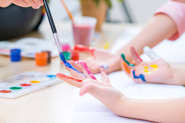 istock Pretty little sisters painting 503991654