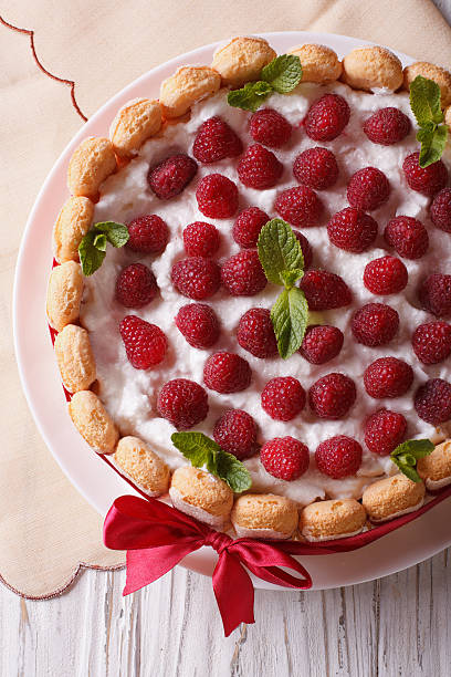 istock raspberry cake with mascarpone and Savoiardi closeup. vertical t 503991688