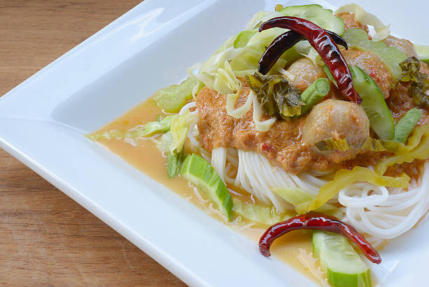 istock noodles with fish curry coconut milk 503992664