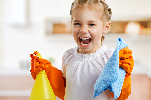 little girl doing housework