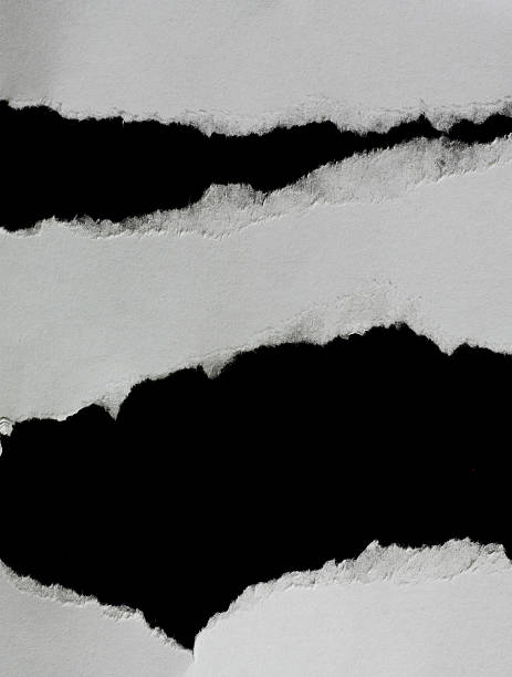 istock Hole ripped in paper 504006456