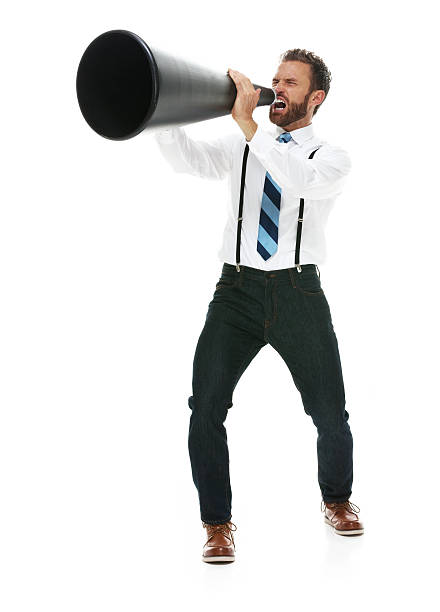 istock Excited businessman shouting with megaphone 504008974