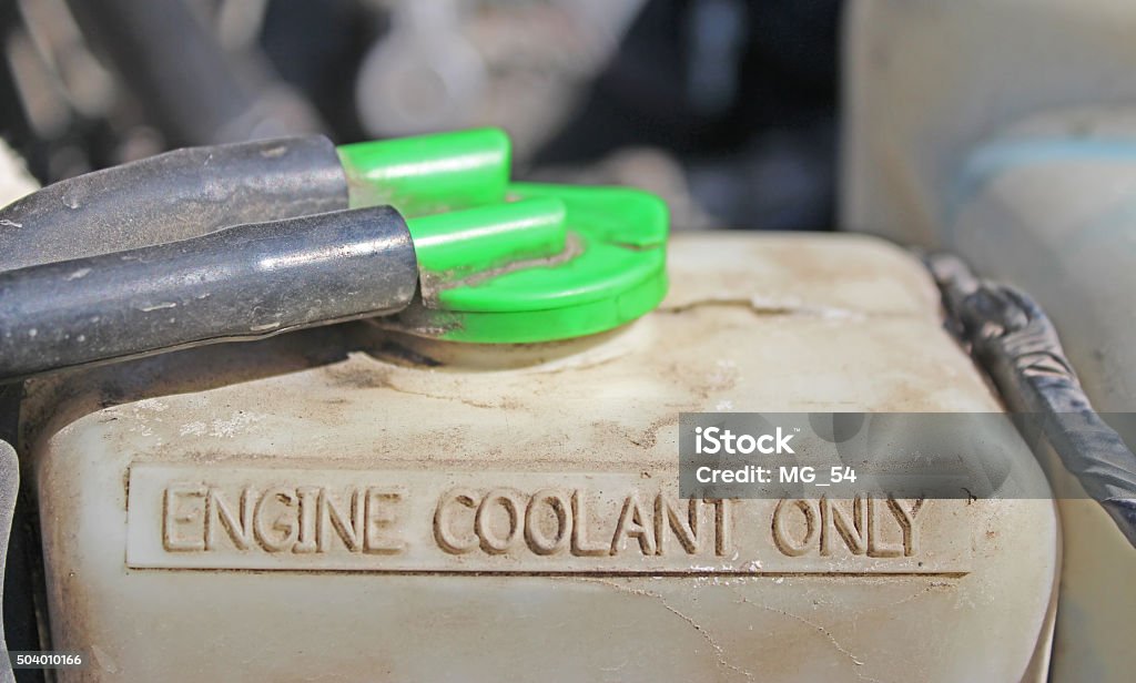 Coolant reservoir under the hood of a car Car Stock Photo