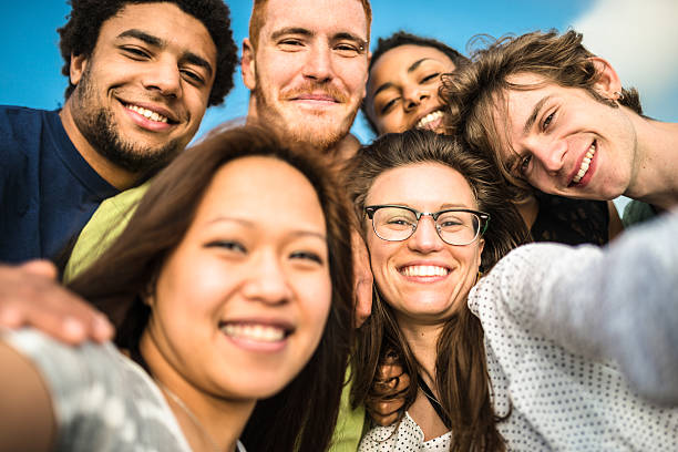 istock Group of friends laughing and doing a selfie 504010674