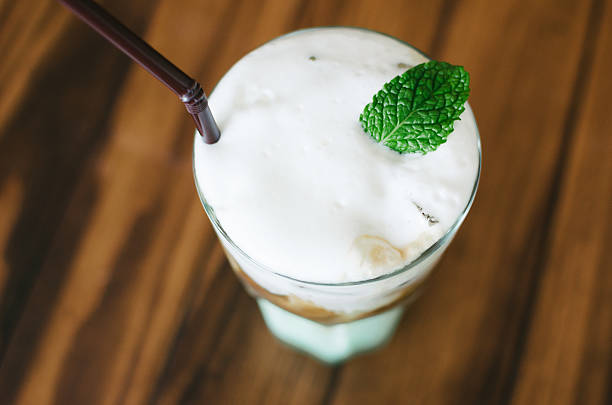 istock Glass of coffee cocktail with mint syrup 504010890