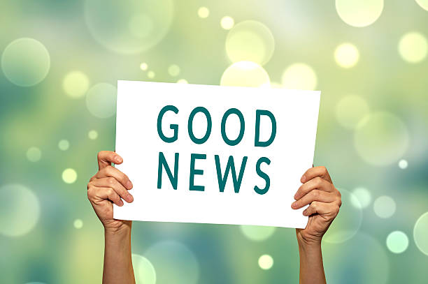 istock GOOD NEWS card in hand with abstract light background. 504014548