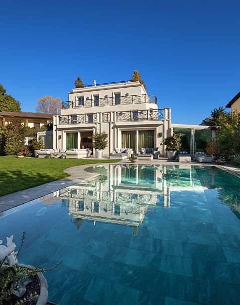 istock beautiful house with pool 504014956