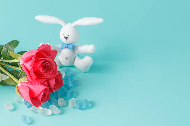 istock Bunny toys with rose flower 504015622