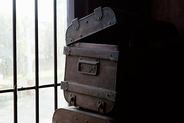 istock Old Iron treasure box in dark room 504017722
