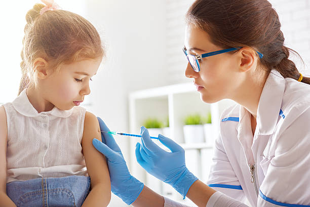 istock vaccination to a child 504017870