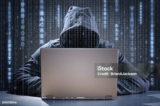 Computer Hacker Stealing Data From A Laptop Stock Photo - Download Image Now - Threats, Internet, Computer Hacker