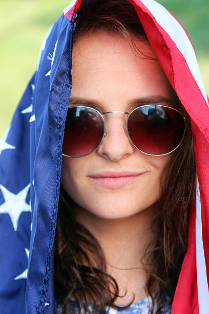 istock Beautiful American girl with flag 504034533