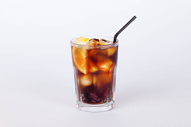 cola cocktail with lemon and ice stock photo