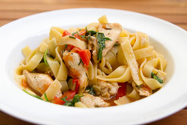 istock tagliatelle with chicken, vegetable and rucola 504035155