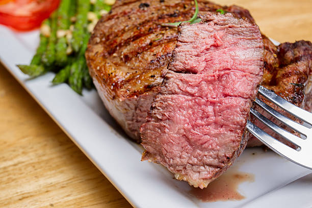 istock Big Rib Eye Beef Steak With Bite Cut Out 504035487