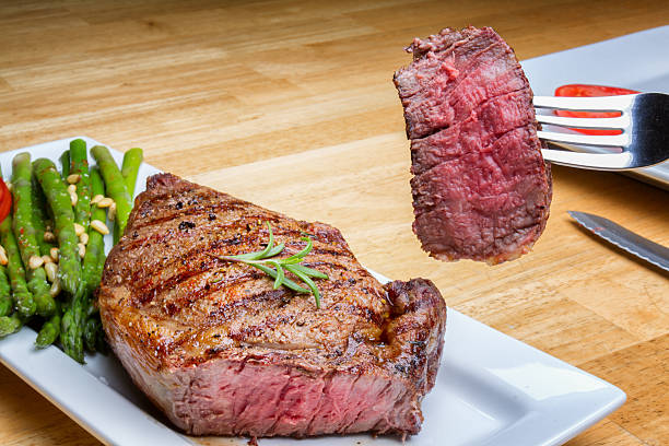 istock Big Rib Eye Beef Steak With Bite Cut Out 504035955