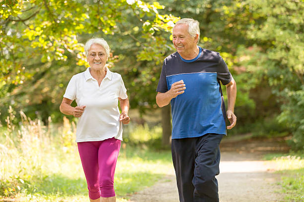 istock Senior couple - jogging in the park 504036661