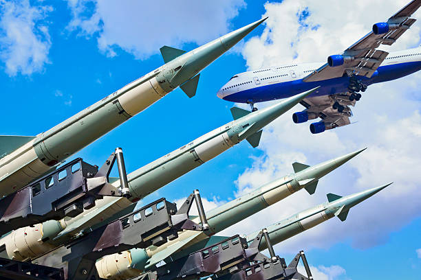 istock Air missiles against jet 504036681