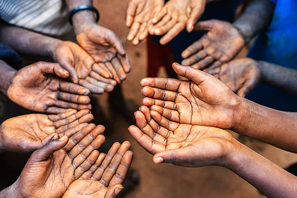 istock Hands of poor - asking for help, Africa 504037081