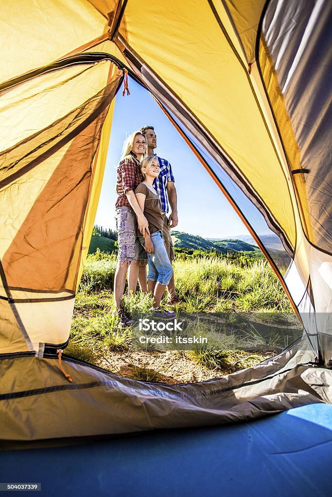 Family camping Father, mother and daughter camping Tent Stock Photo