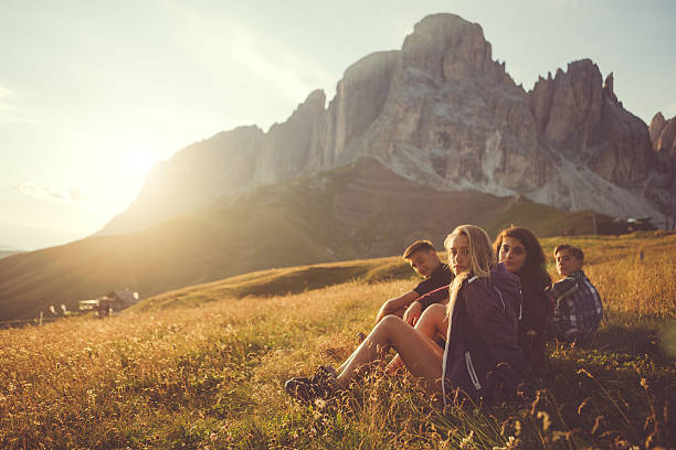 istock Adventures on the Dolomites: friends enjoying sun 504037918