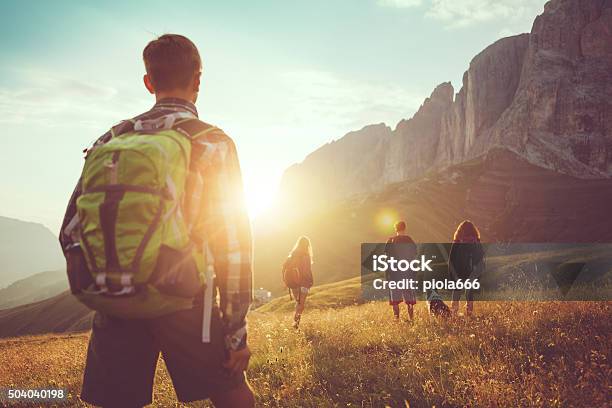 Adventures On The Dolomites Friends Hiking With Dog Stock Photo - Download Image Now