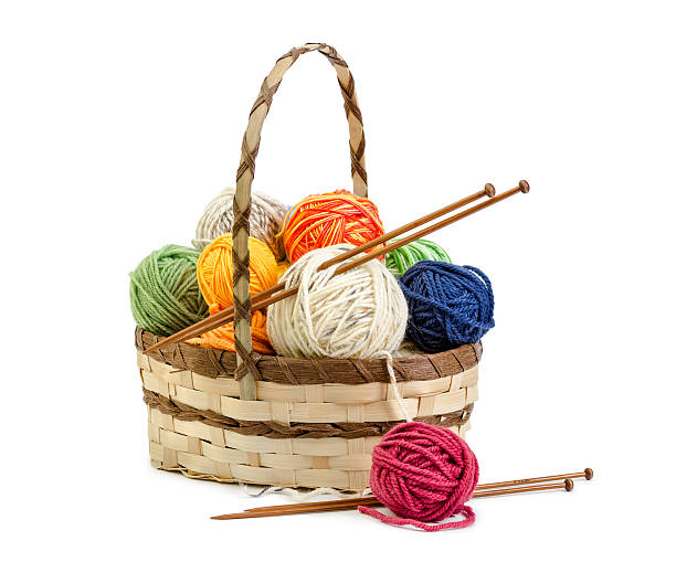 istock Wicker basket with balls of yarn 504041048