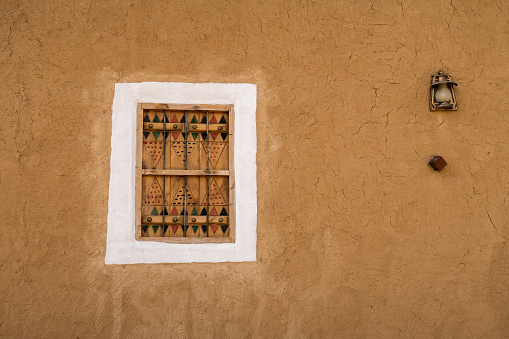 Window and lamp in desrted village Old Sudair, Saudi Arabia
