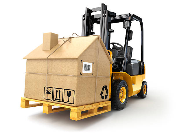 istock Delivery or moving houseconcept. Forklift with cardboard box as 504044040