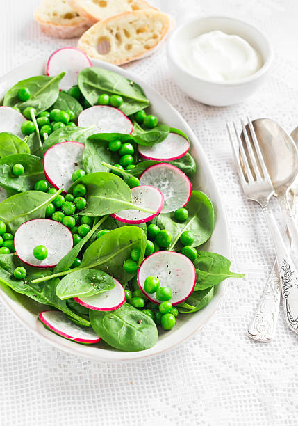 istock Fresh green peas, spinach and radish salad 504044572