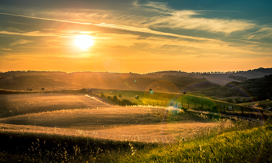 Beautiful sunset over hills of Tuscany, Italy