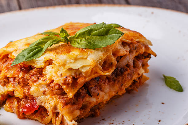 istock Traditional lasagna made with minced beef bolognese sauce. 504045036