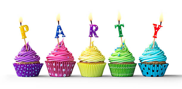 istock Colorful party cupcakes on white 504047174