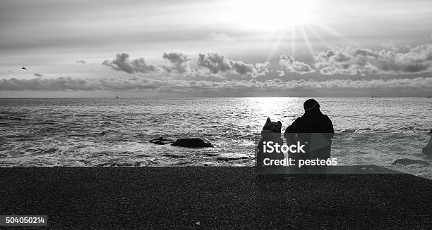 Dad And Son Front Of The Sea Black And White Stock Photo - Download Image Now - Adult, Arrangement, Back Lit